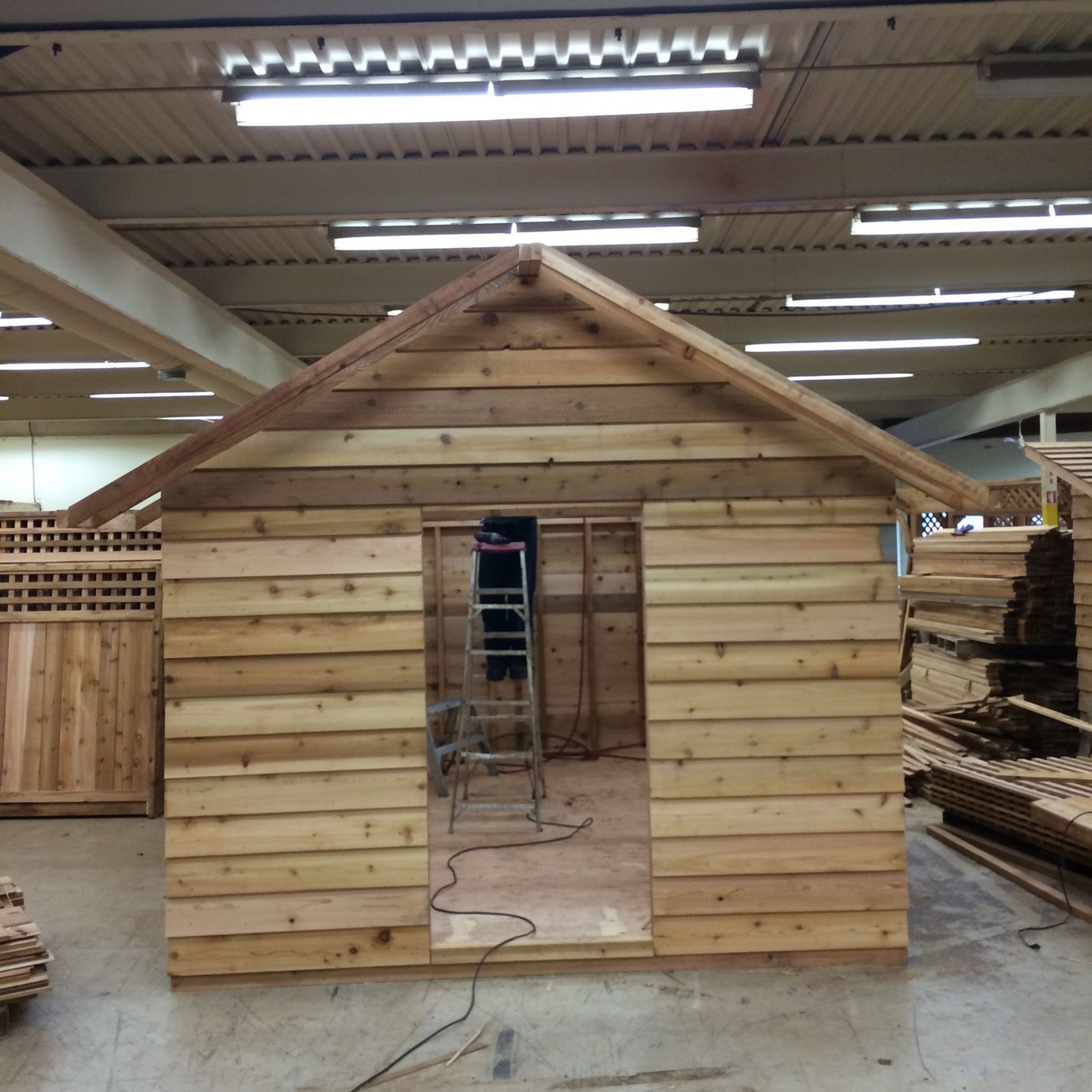 Cedar shed with vertical board siding