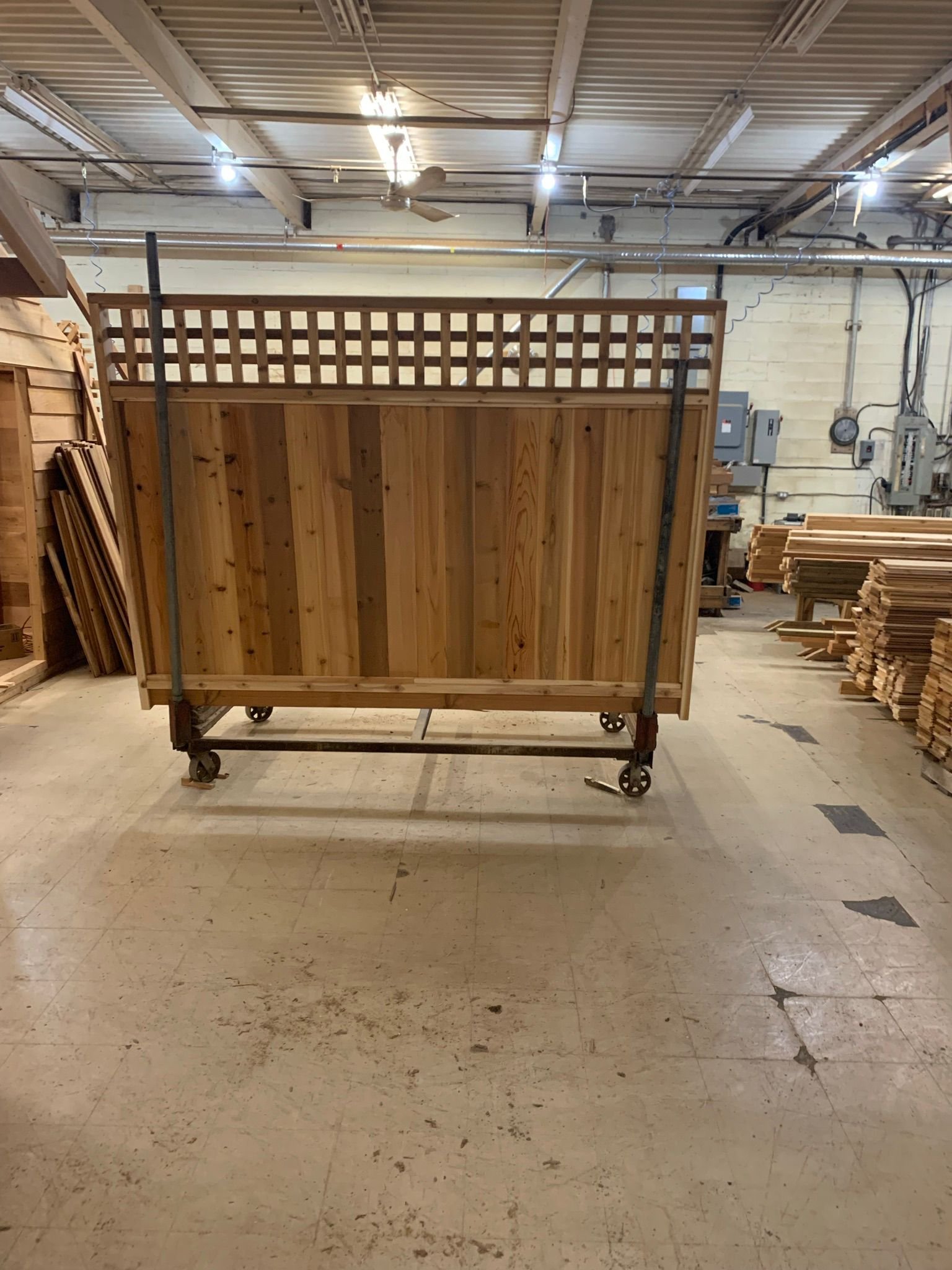 Cedar fence panel on assembly cart